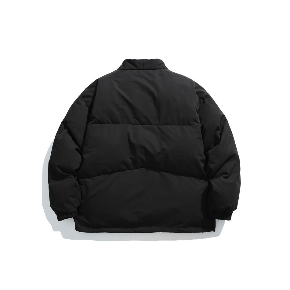 Back view of a black padded jacket with broad horizontal quilted panels and elastic cuffs.