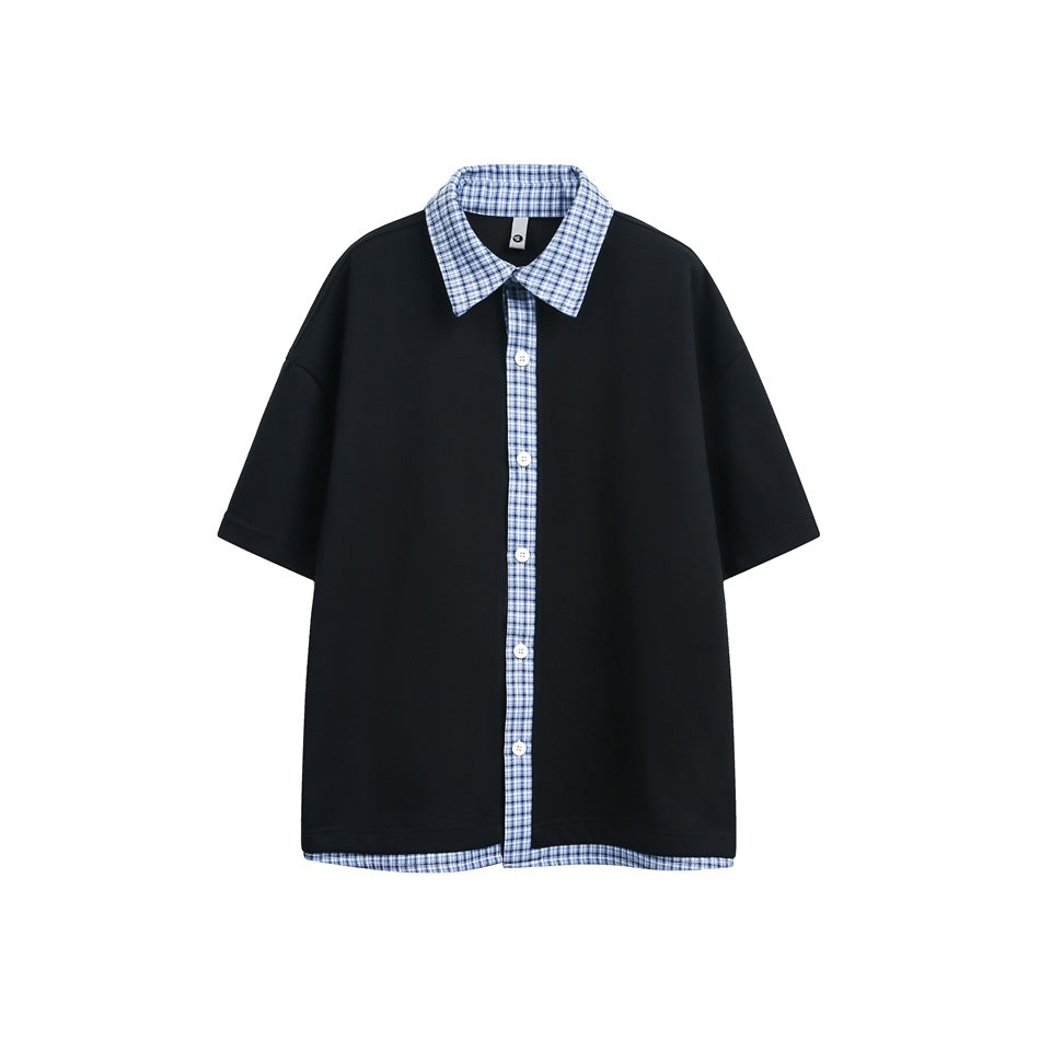 Black short-sleeve top with blue plaid collar, button placket and hem layer, flat front view