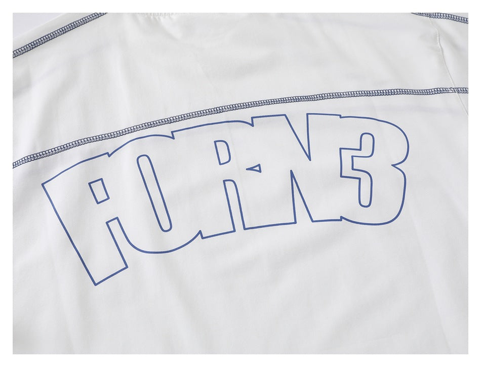 Close-up of a white shirt with navy seam detailing and large outlined blue “RUN3” lettering.