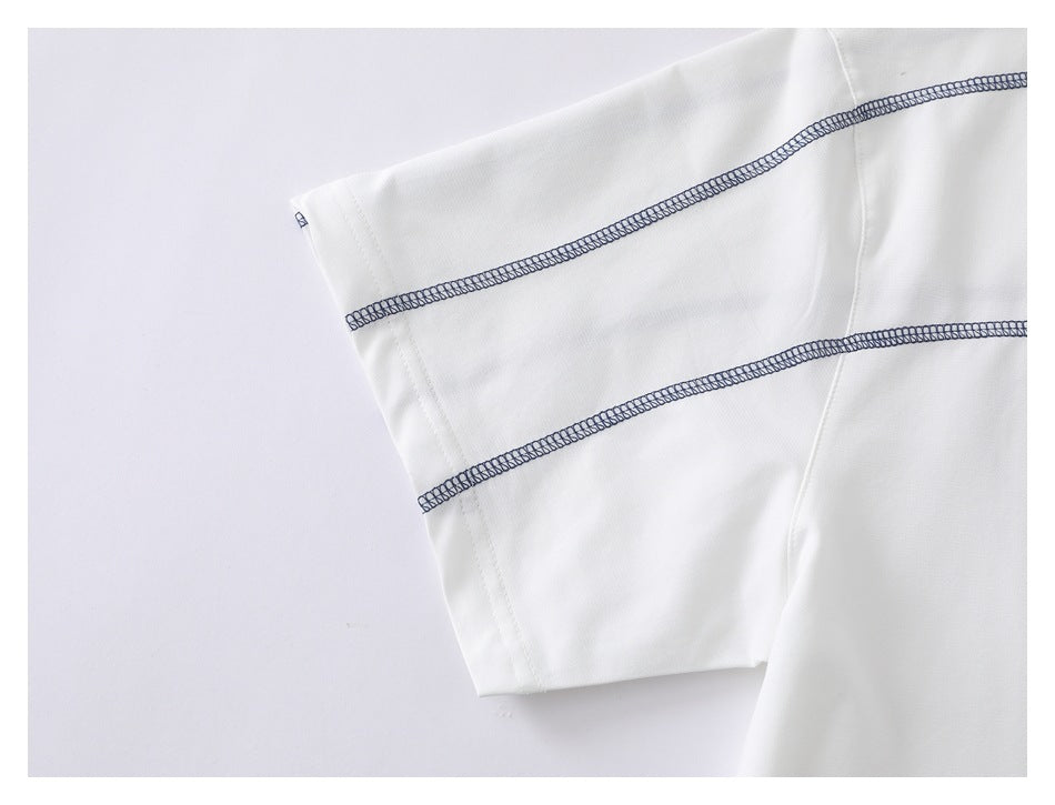 Close-up of a white short sleeve with two parallel navy overlock seams.