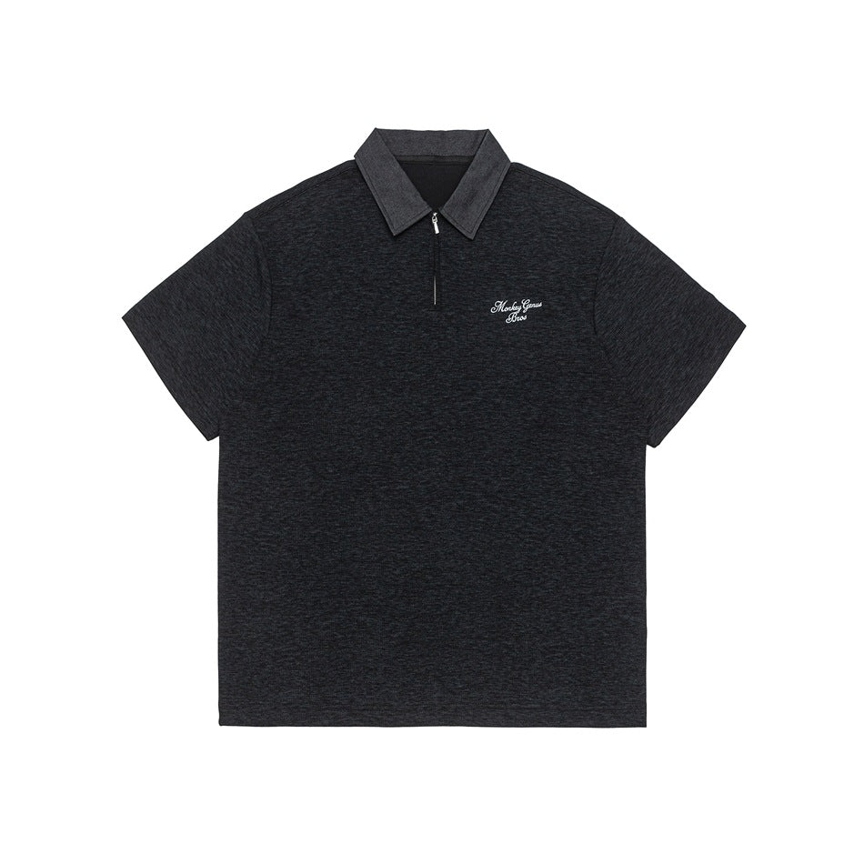 Black heather gray short-sleeve half-zip polo with gray collar and white script chest embroidery, flat lay