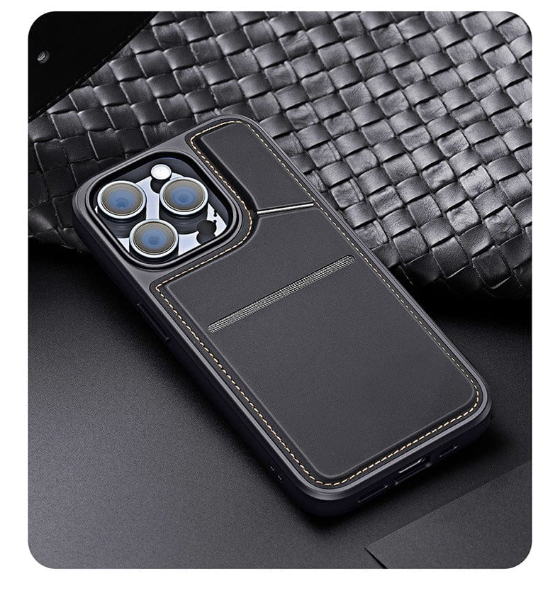 A black iPhone 16 Pro Max with three camera lenses is displayed in a sleek, full-coverage leather business case featuring a stitched cardholder pocket on the back, MagSafe compatibility, and a rotating stand, all placed on a textured woven surface.