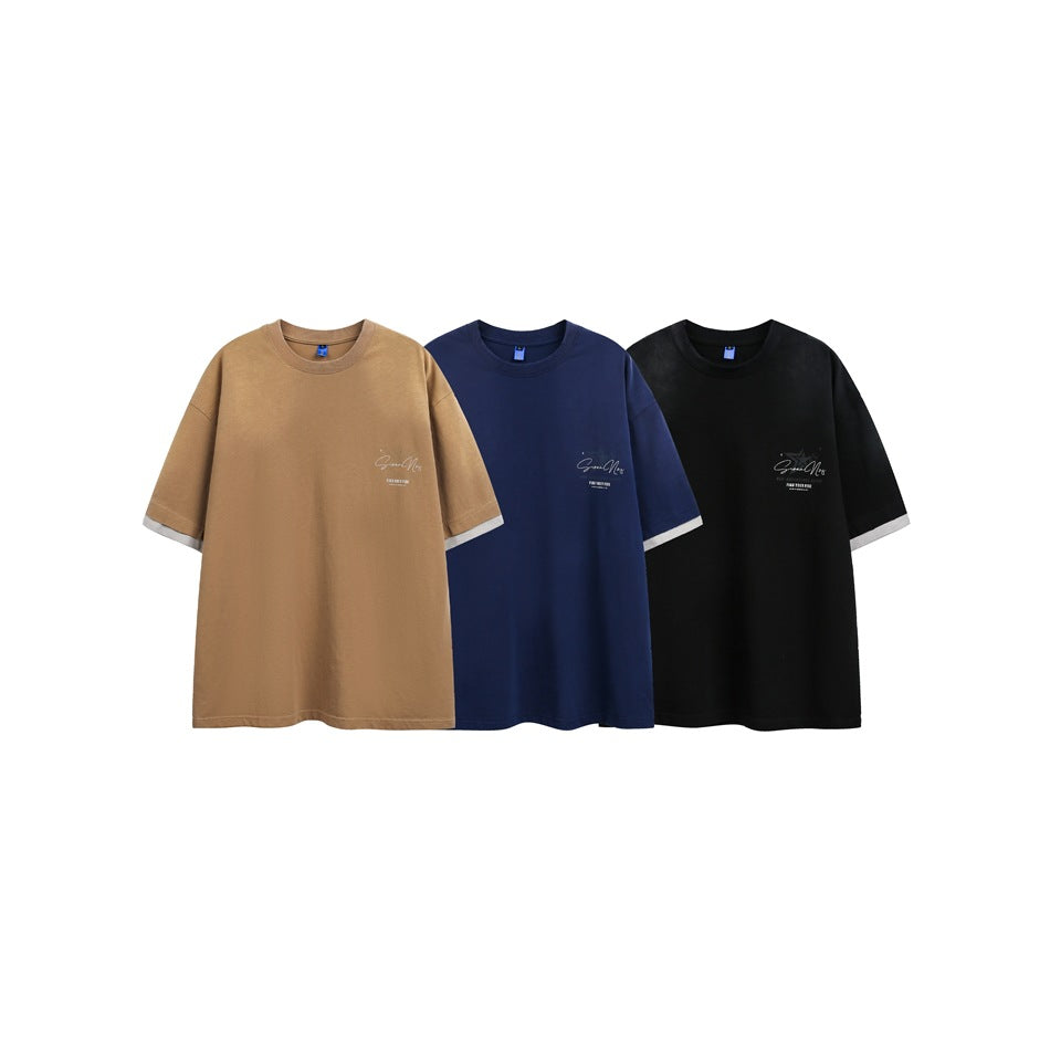 Three front-view T-shirts in tan, navy, and black with small chest graphics and light contrasting sleeve trim.