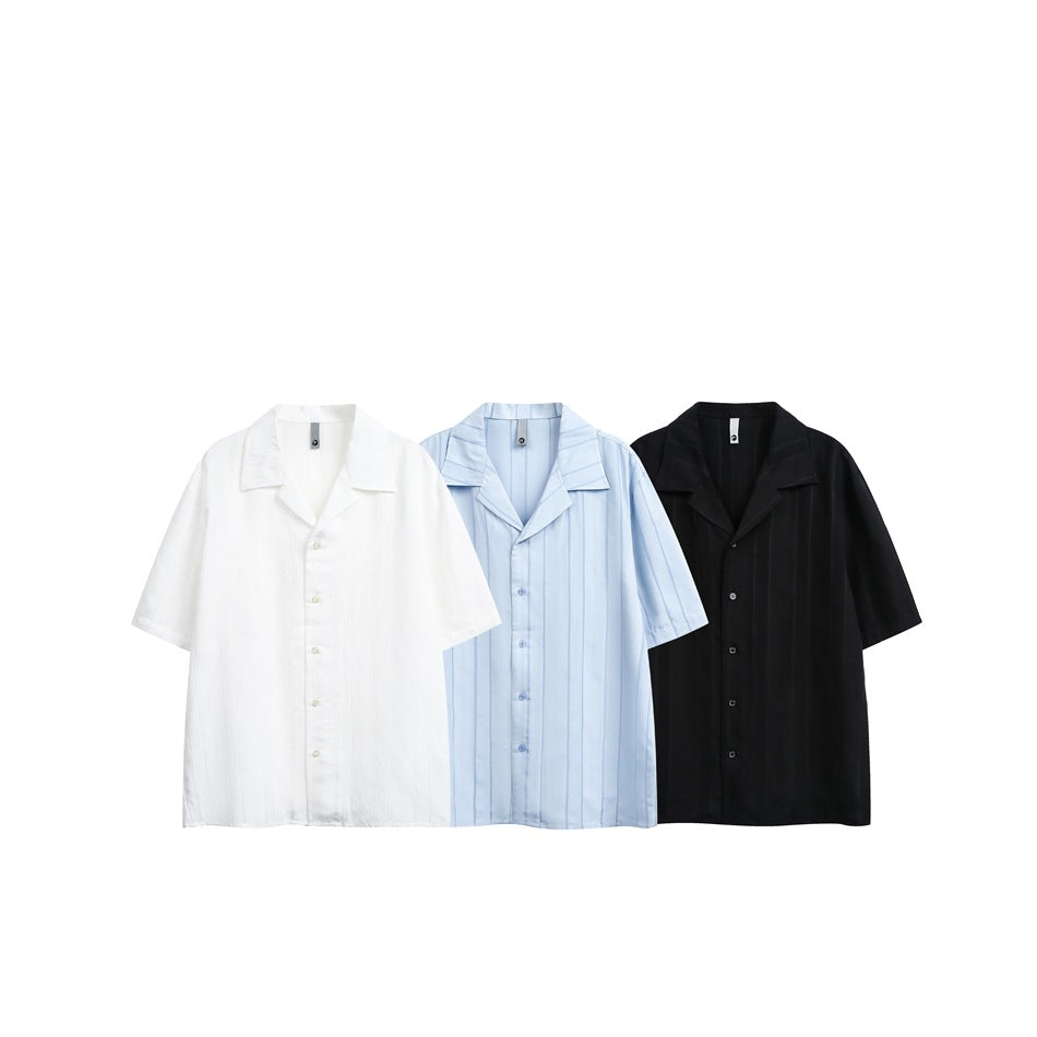 Three short-sleeve open-collar shirts shown together in white, light blue striped, and black.
