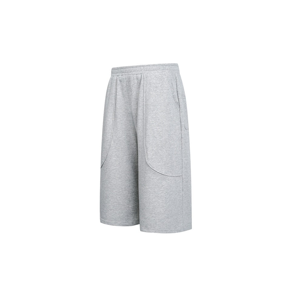 Heather gray knee-length shorts with elastic waistband and curved front seams, shown flat from a three-quarter angle