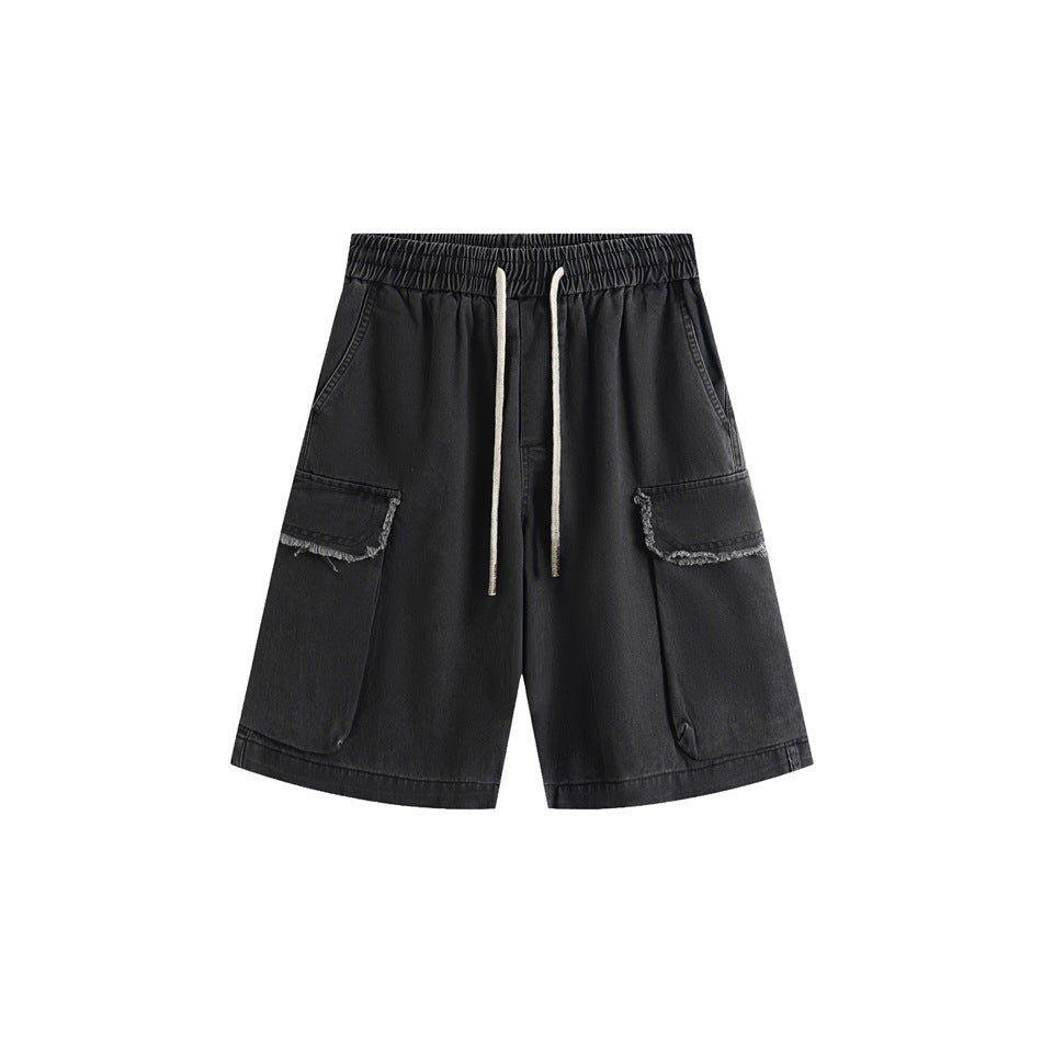 Black washed cargo shorts with drawstring waist and frayed-edge side cargo pockets, front view