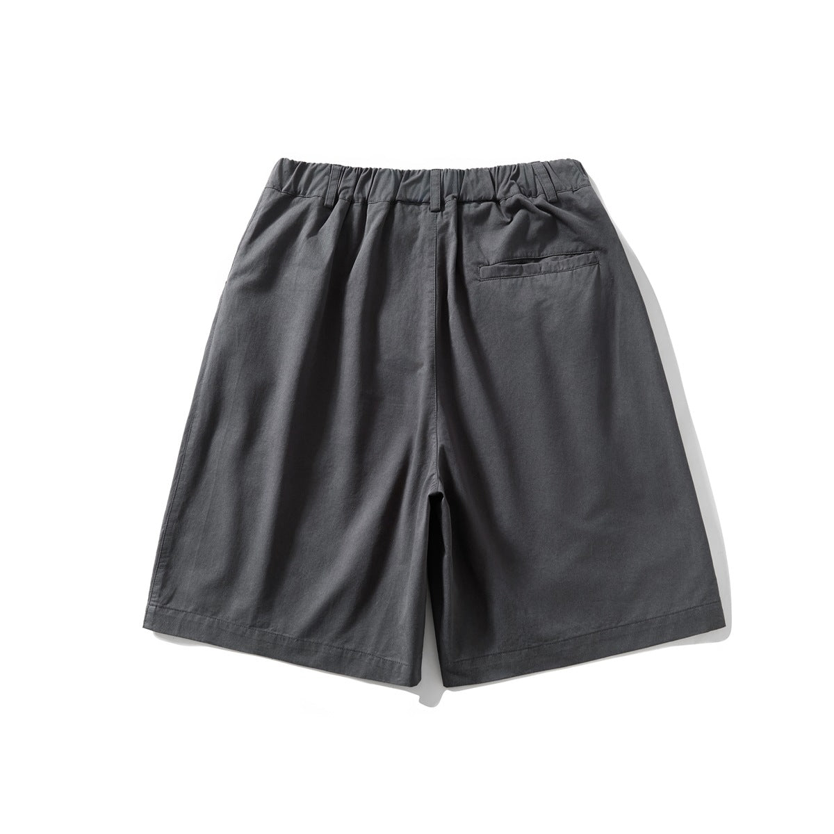 Dark gray knee-length shorts flat lay, back view with elastic waistband and a single welt pocket
