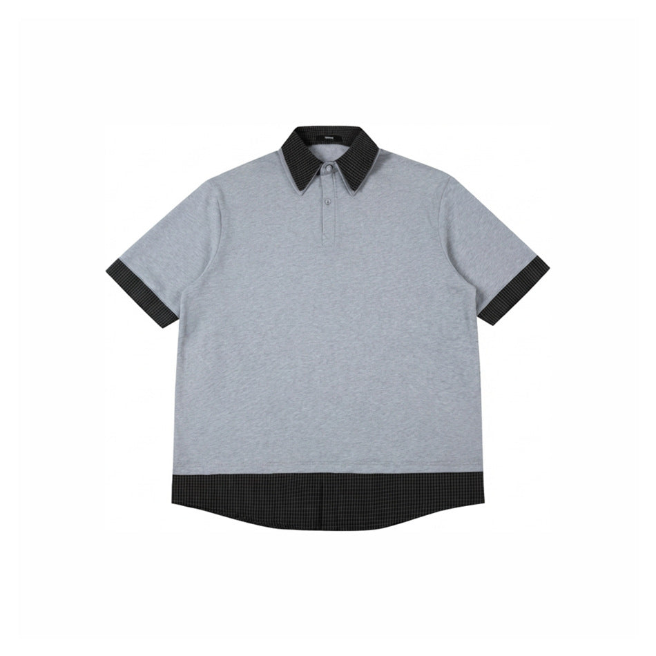 Heather gray short-sleeve polo top with black checked collar, sleeve cuffs and layered hem, flat lay front view