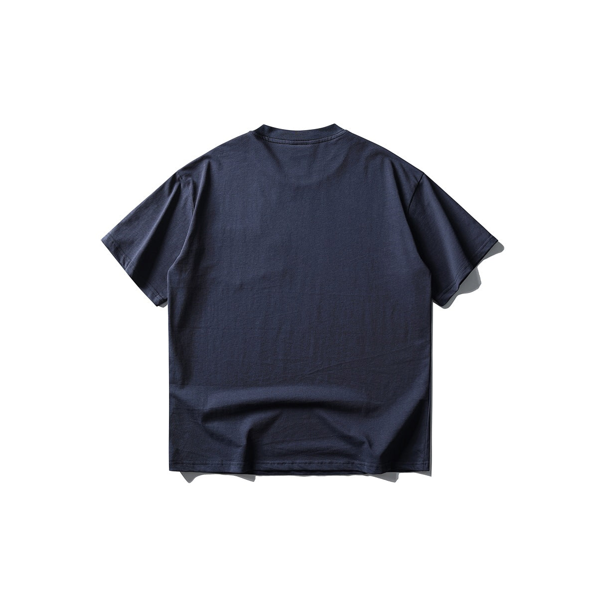 Back view of navy short-sleeve crew neck T-shirt flat lay with plain back and ribbed neckline