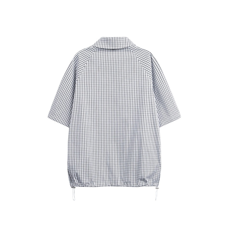 Back view of a light gray-and-white checked short-sleeve shirt with an adjustable drawcord hem.