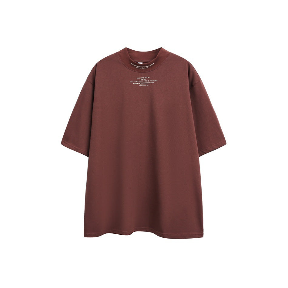 Burgundy short-sleeve mock-neck T-shirt with small cream text print on the collar band and chest, flat front view