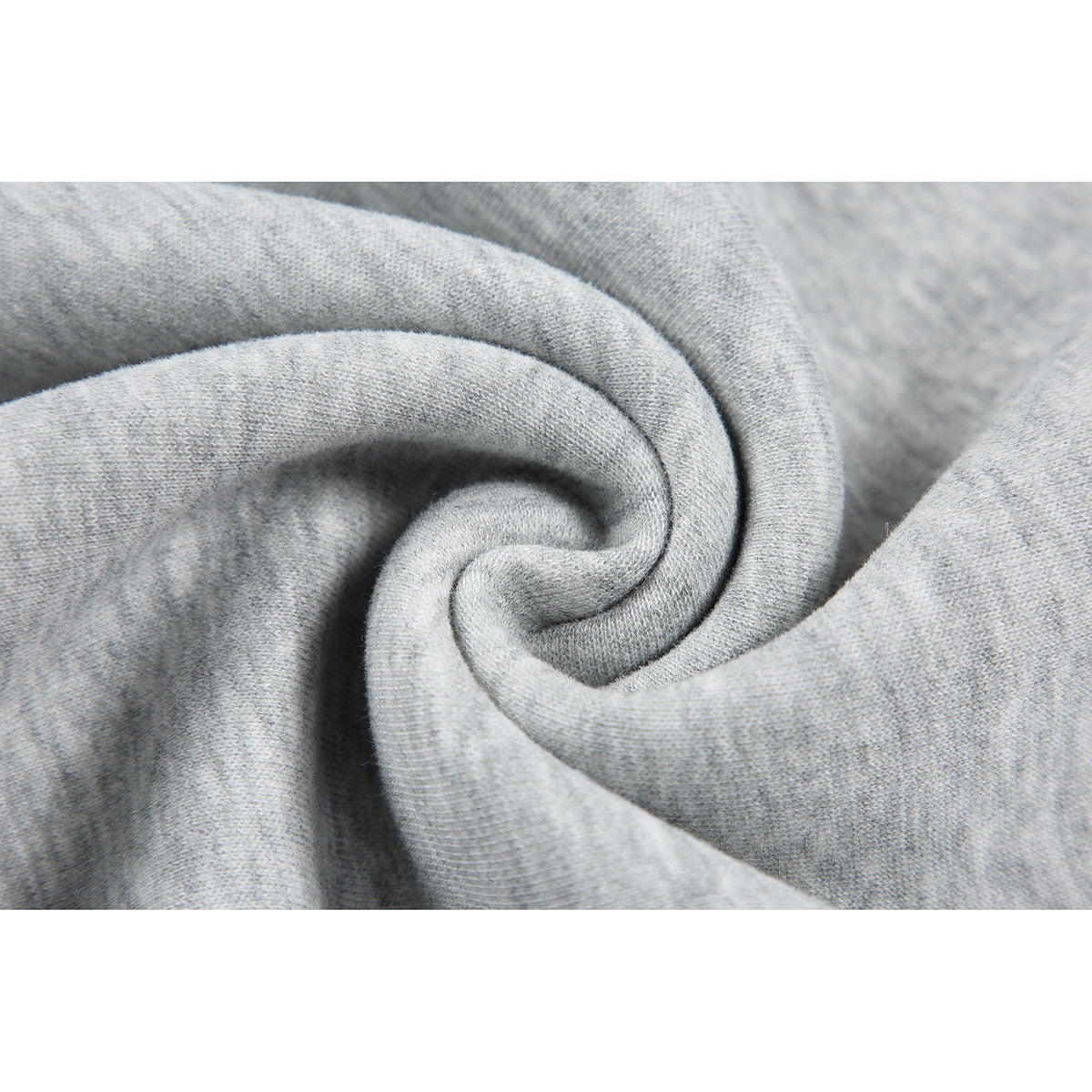 Extreme close-up of heather-gray sweatshirt fabric gathered into folds.