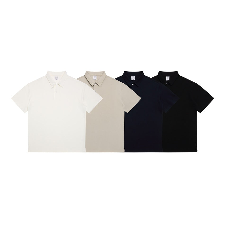 Four short-sleeve collared polo shirts shown from the front in off-white, beige, navy, and black.
