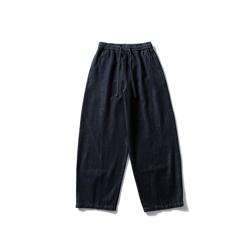 Dark blue wide-leg denim pants with elastic drawstring waist, flat-lay front view