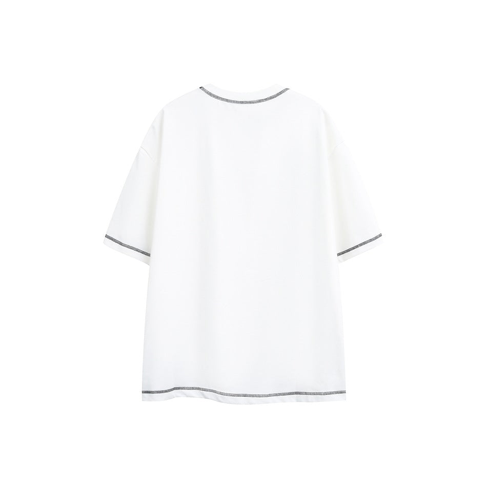 Back view of a white oversized T-shirt with dark contrast stitching at the collar, sleeve hems, and hem.