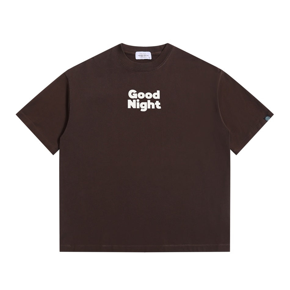 Brown short-sleeve crew neck T-shirt with cream 'Good Night' print on chest, flat front view