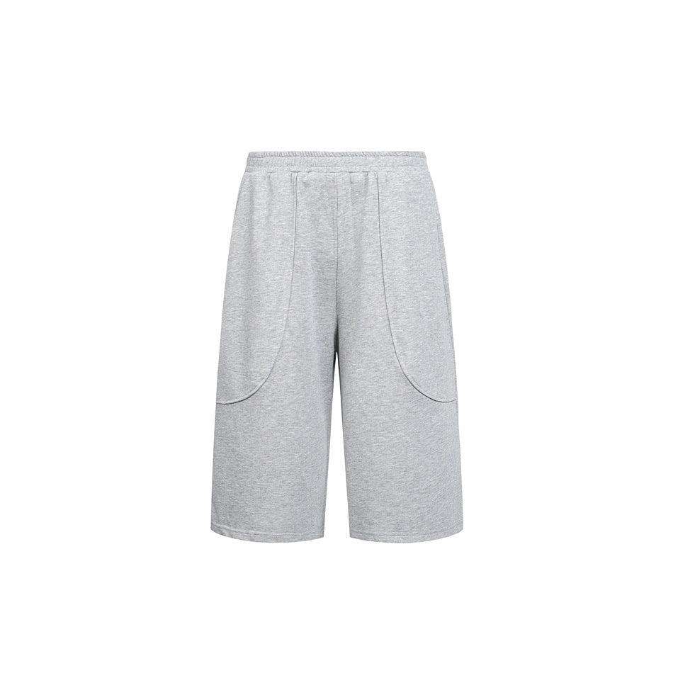 Light gray knee-length shorts shown from the front, with an elastic waist and large curved front pockets.