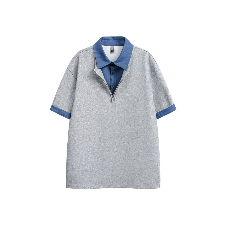Heather gray short-sleeve half-zip polo top with blue denim-look collar, placket and cuffs, flat front view
