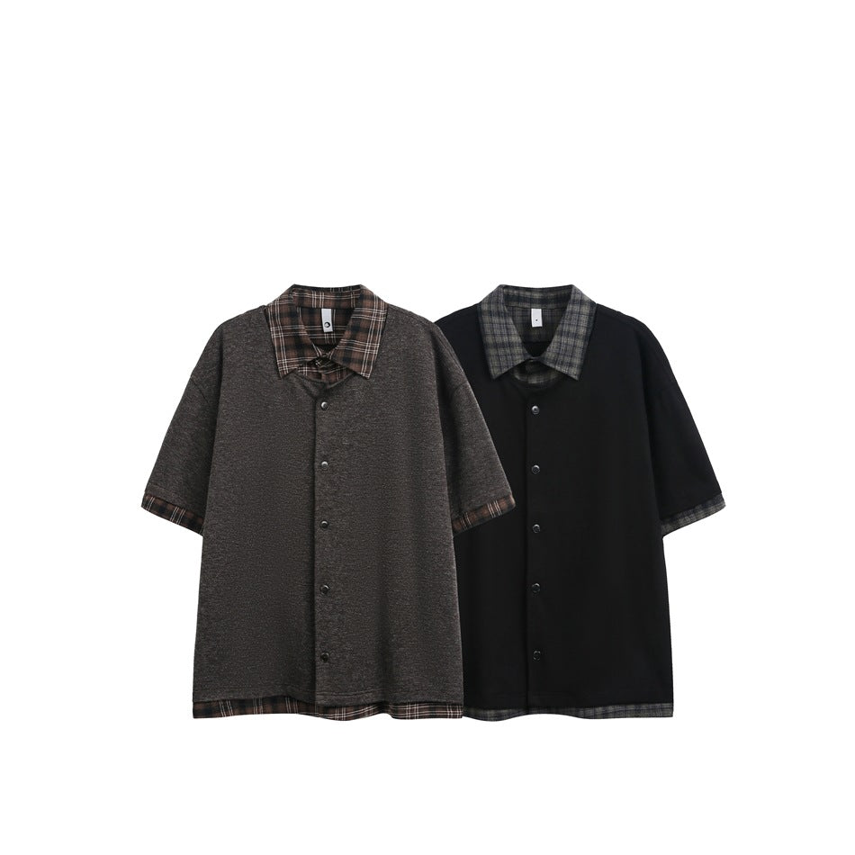 Two short-sleeve button-front overshirts displayed flat: brown with brown plaid trim and black with dark plaid trim.