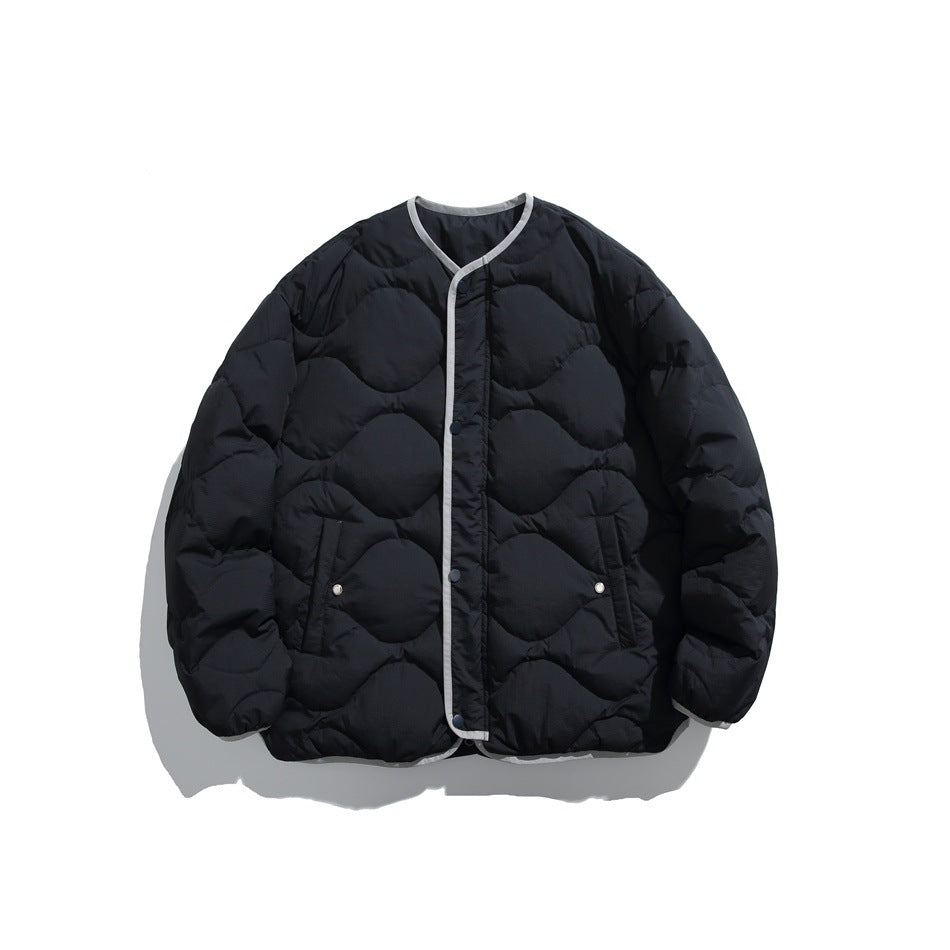 Dark navy quilted collarless jacket with gray trim and snap front, flat view