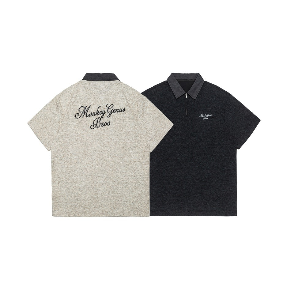 Light beige and charcoal short-sleeve collared shirts shown from the back and front; both have script embroidery.