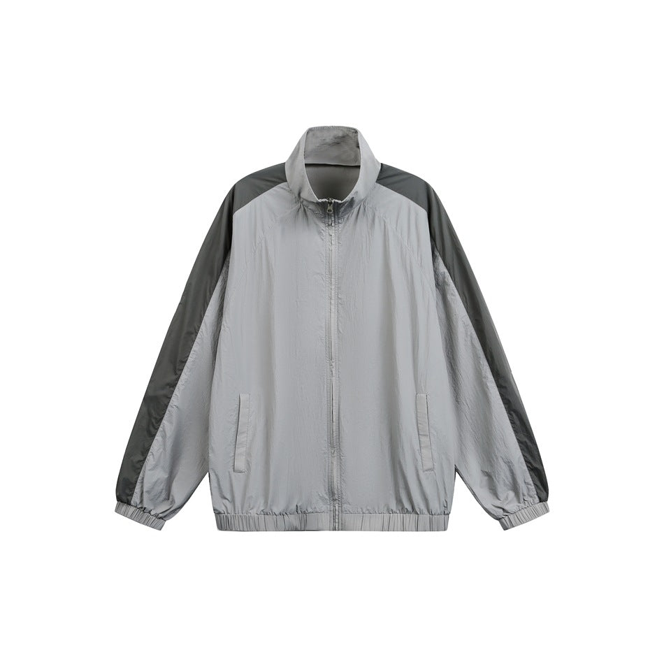 Gray zip-up jacket with stand collar and darker gray shoulder and sleeve panels, flat front view