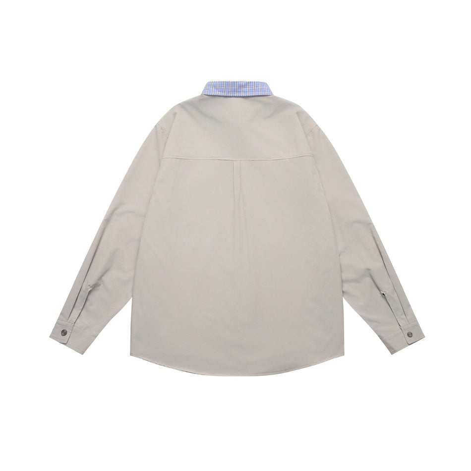 Back view of a light beige long-sleeve shirt with a blue plaid collar and buttoned cuffs.