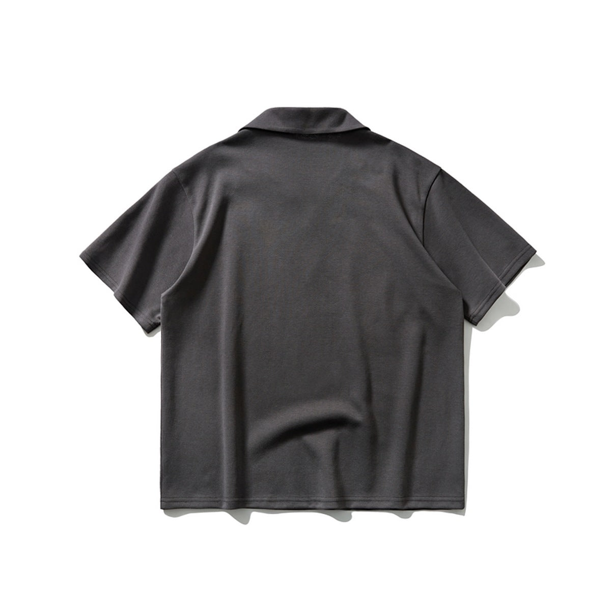 Back view of a charcoal short-sleeve polo shirt laid flat on a white background.