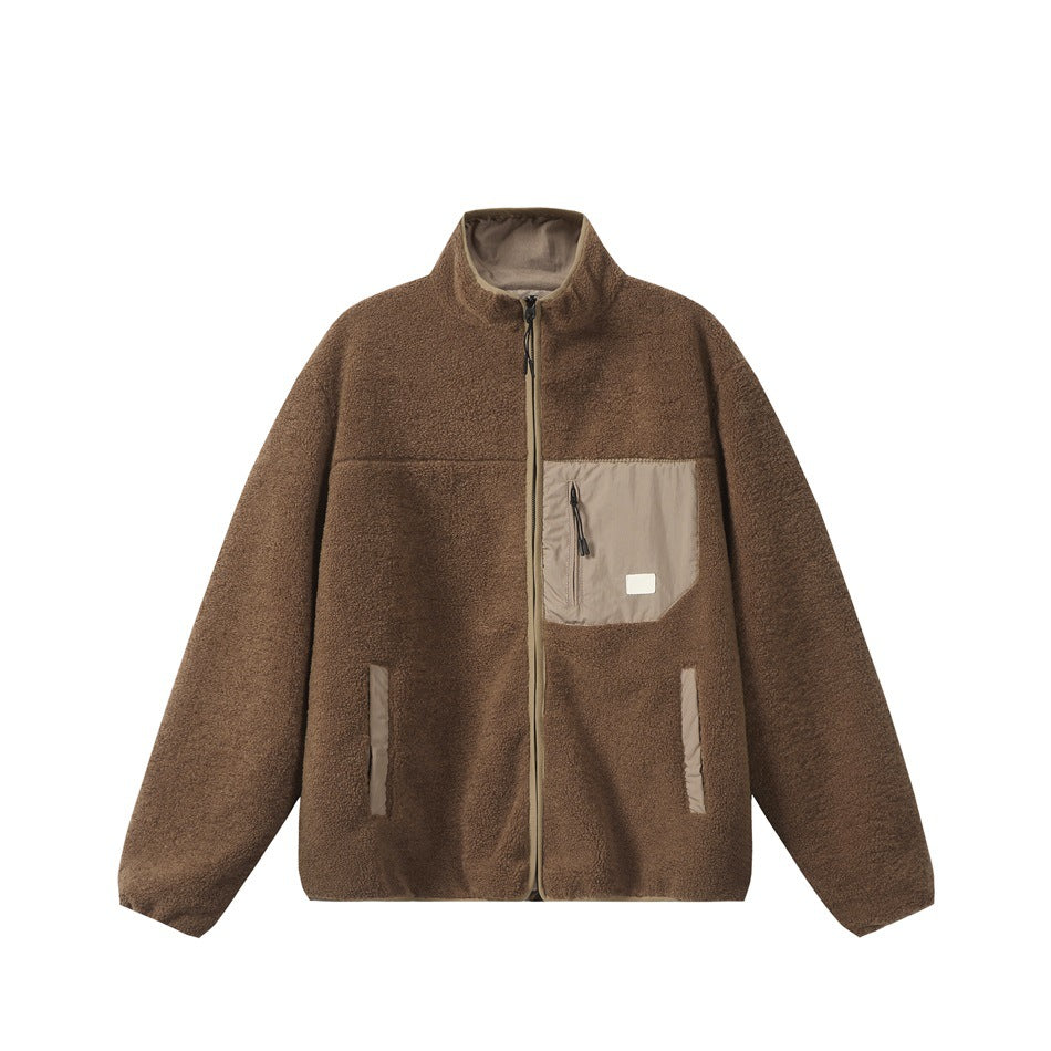 Brown stand-collar zip jacket in textured fleece-like fabric with taupe chest zip pocket and taupe trim