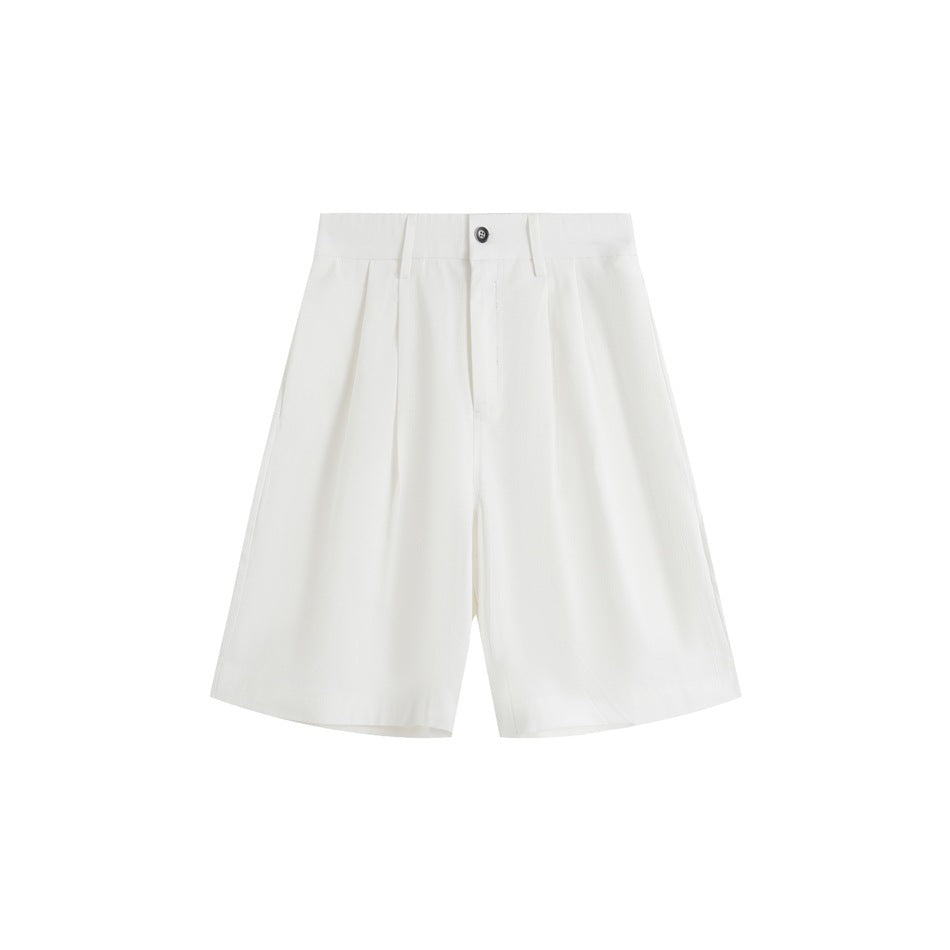 White pleated knee-length wide-leg shorts, front flat lay with button closure and belt loops