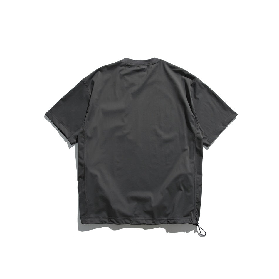 Back view of a charcoal short-sleeve crew-neck shirt with adjustable hem cord.