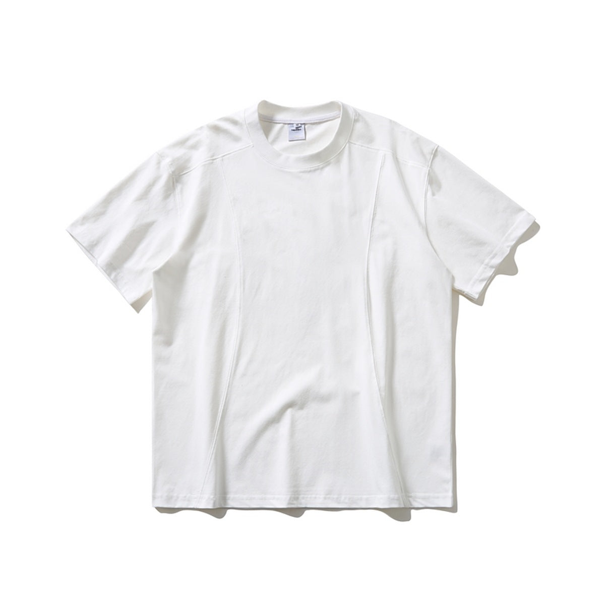 White short-sleeve crew-neck T-shirt flat lay with curved front panel seams