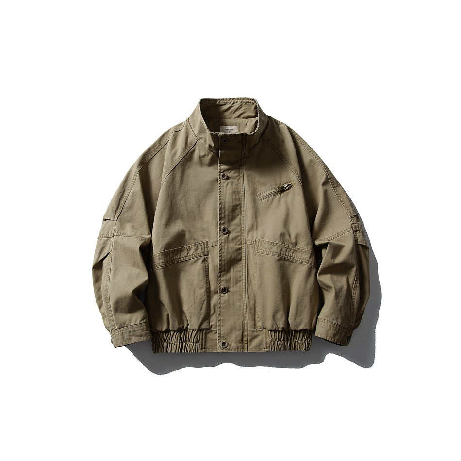 Khaki stand-collar jacket flat lay, front view, with snap placket, chest zip pocket, patch pockets and elastic hem
