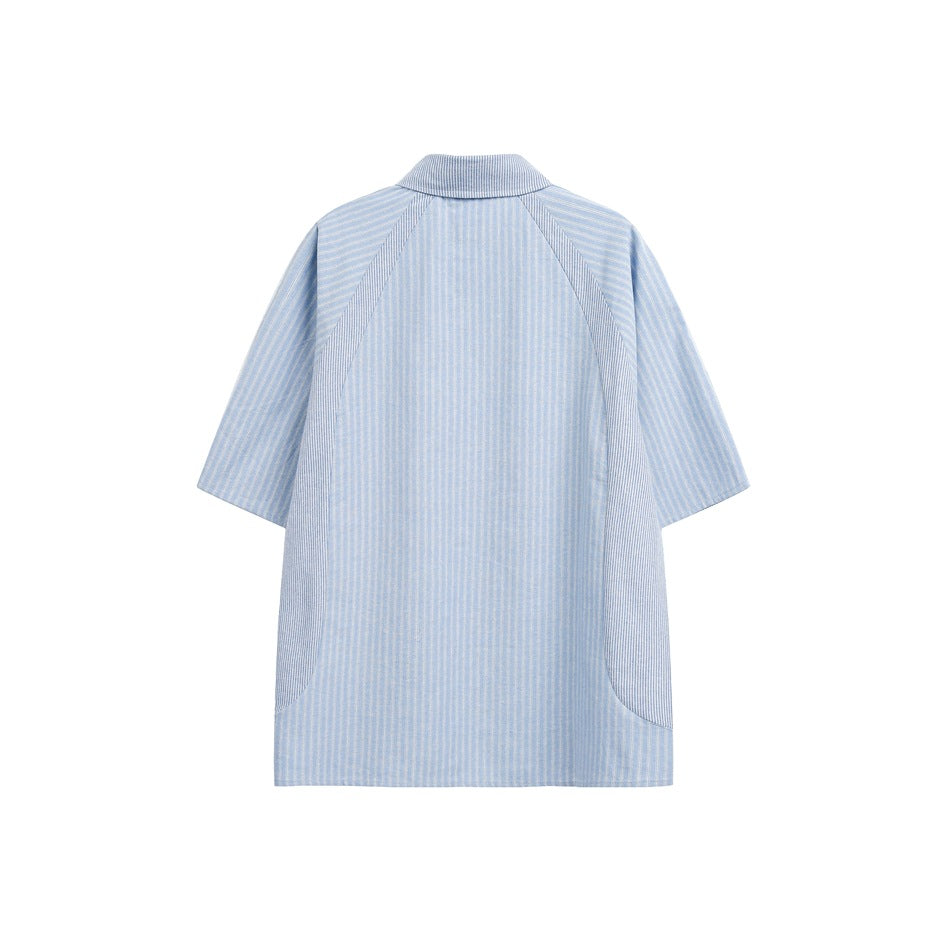 Back view of a light blue and white striped short-sleeve shirt with a collar and curved panel seams.