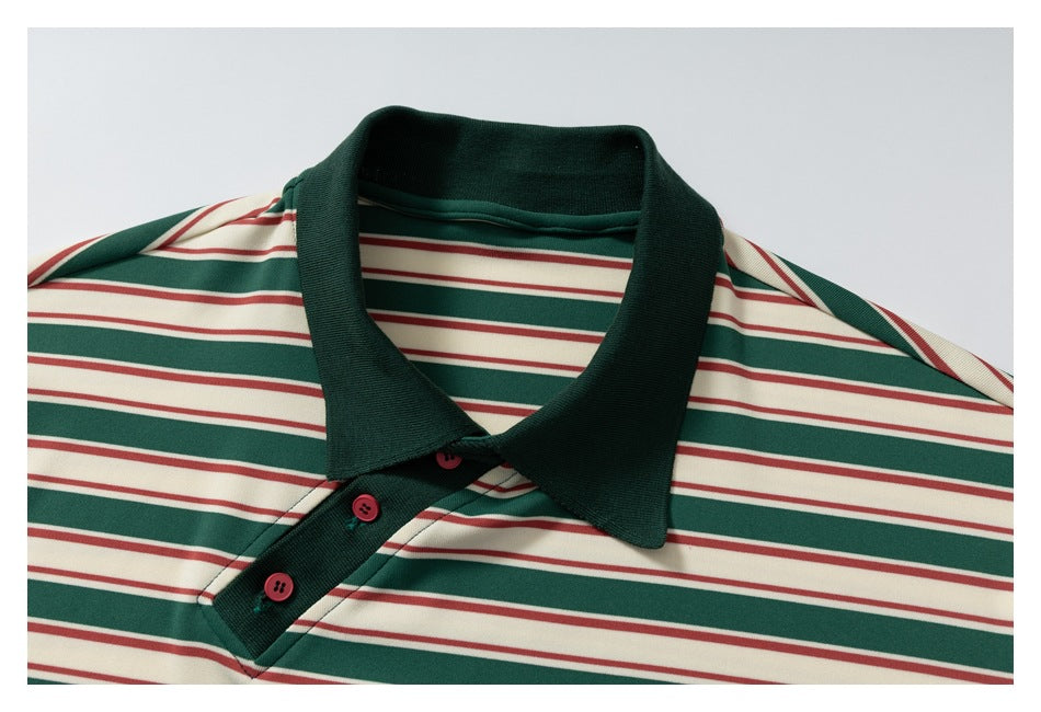 Close front view of a striped polo shirt with a dark green collar and placket and three red buttons.