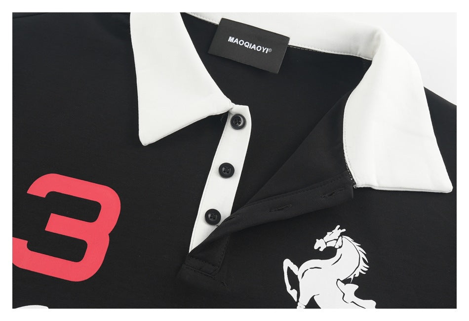 Close-up of the black polo's white collar and button placket, with part of the red number and white horse graphic visible.