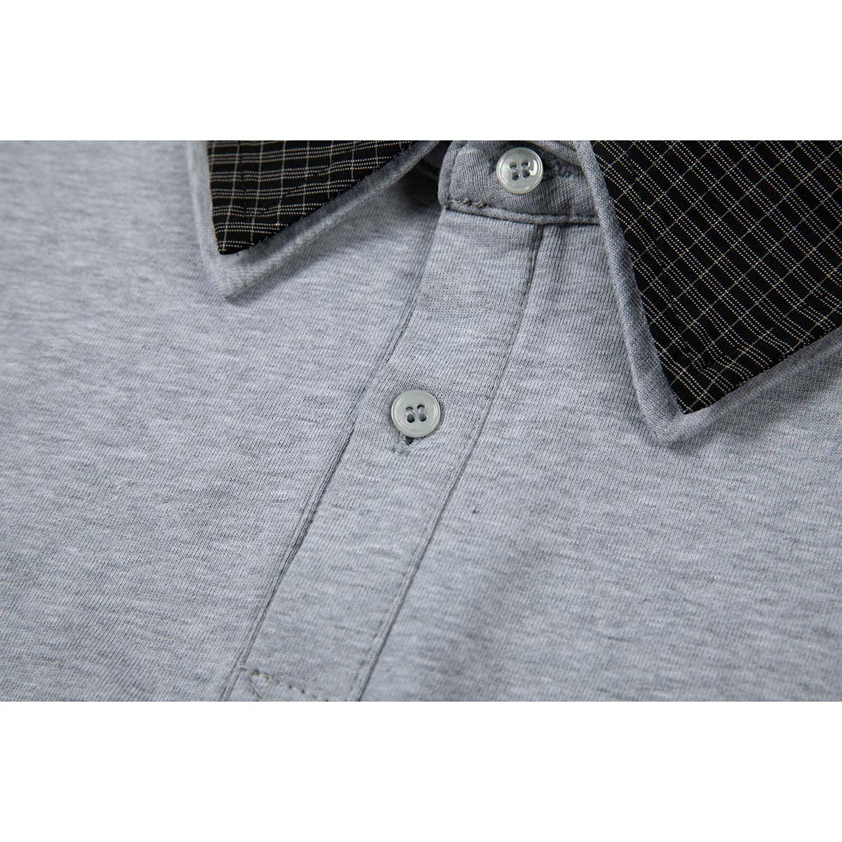 Close-up of the gray polo shirt's two-button placket and black fine-check collar.