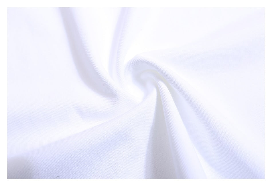 Close-up of the smooth white T-shirt fabric gathered into a soft swirl.