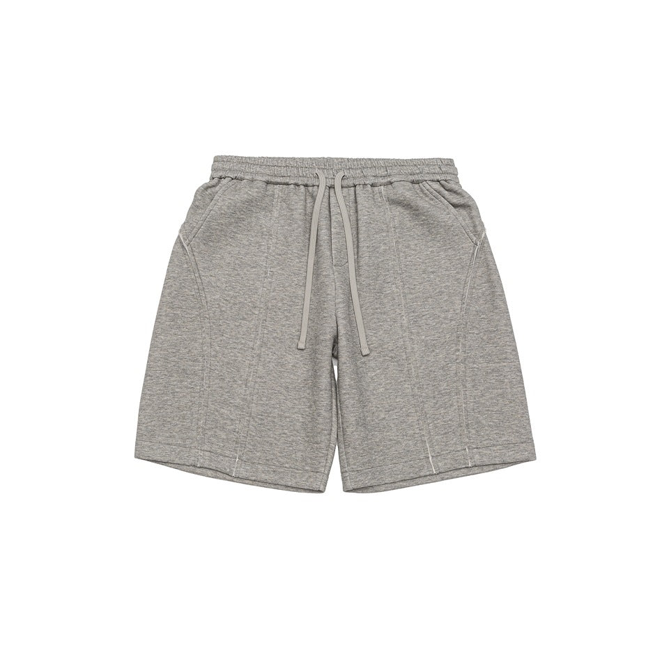 Light gray heathered drawstring shorts with elastic waist, side pockets and vertical front seams, flat front view