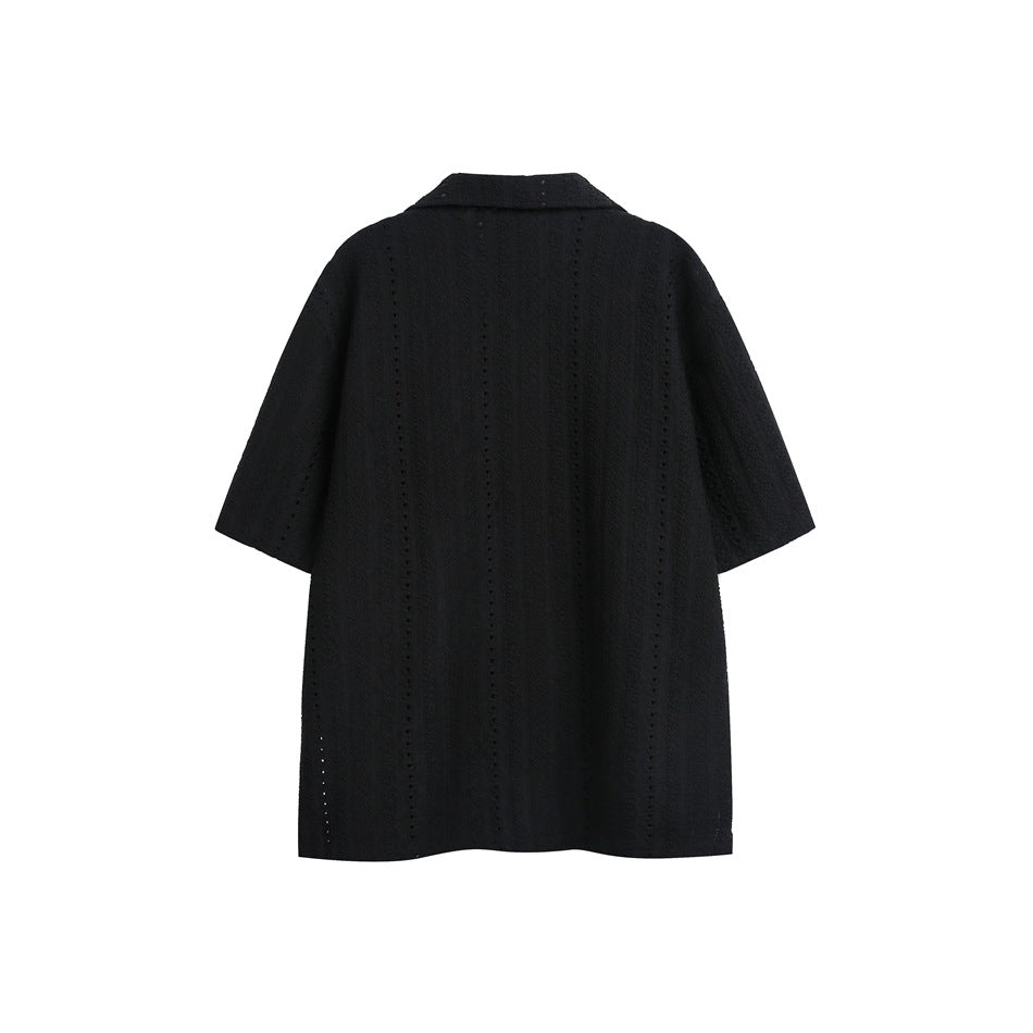 Back view of a black short-sleeve button-up shirt with a wide collar and vertical openwork stripes.