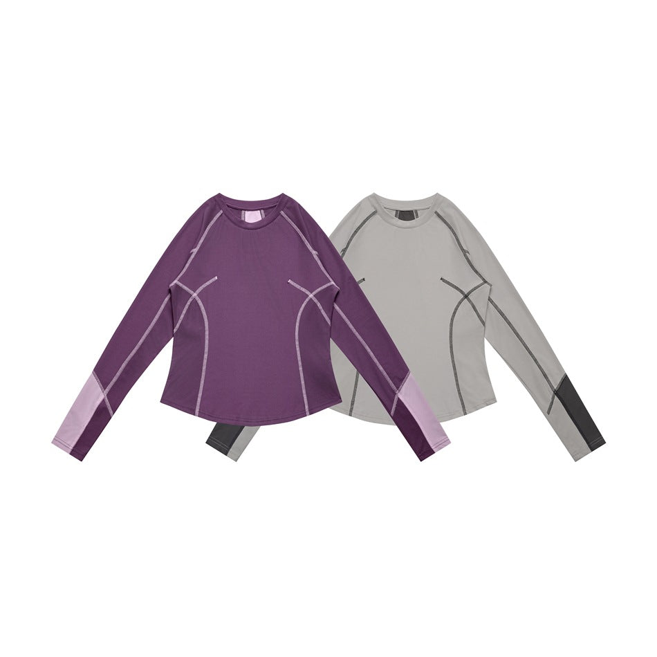 Two long-sleeve tops shown from the front: plum with lavender seam accents and gray with dark seam accents.