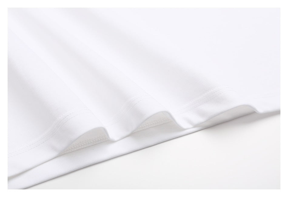 Close-up of the white T-shirt's double-stitched bottom hem.