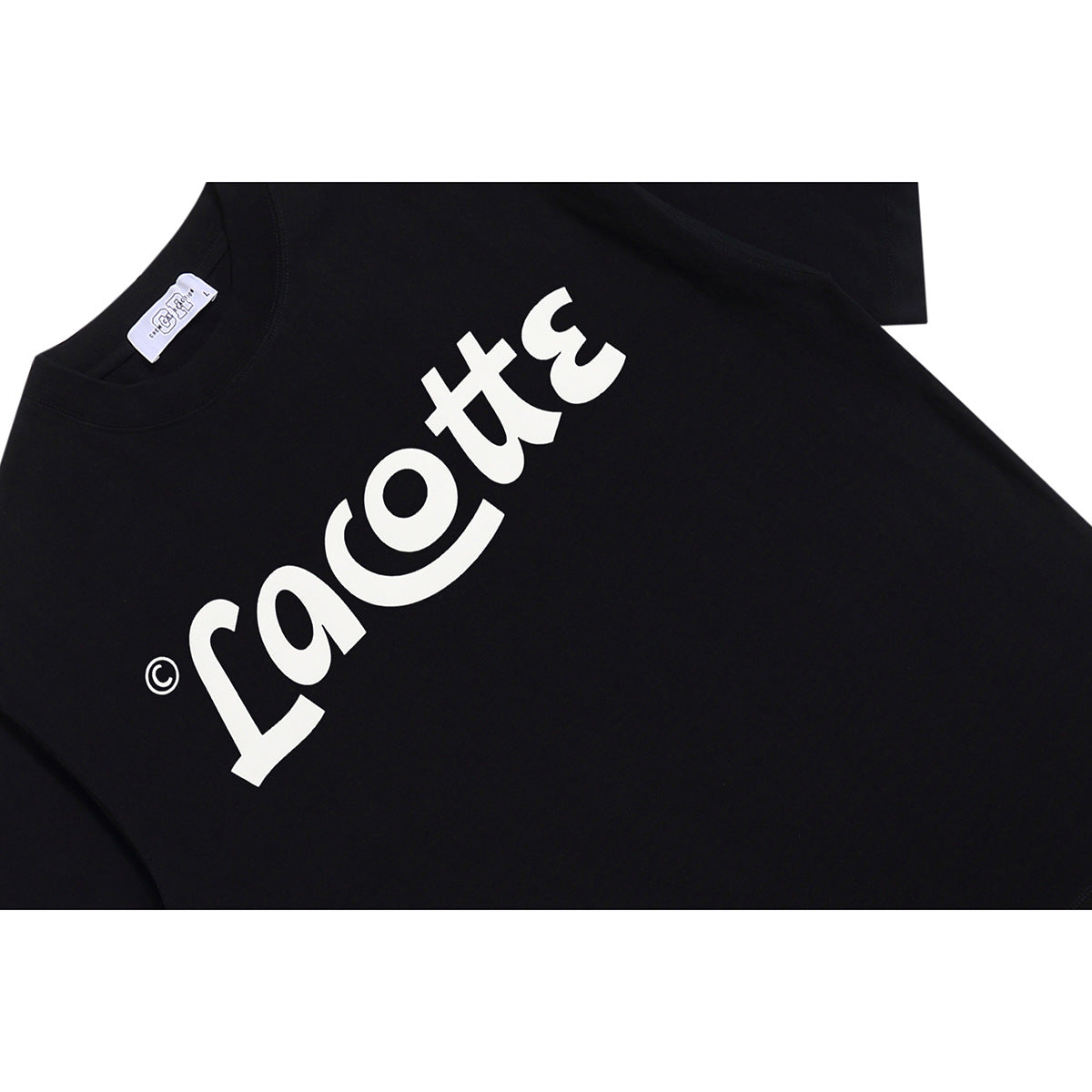 Close-up of a black T-shirt with a large white chest logo and visible collar label.