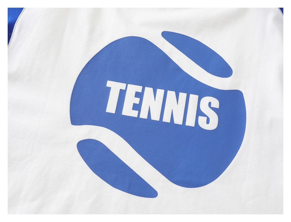 Close-up of a white garment with a large blue graphic and the word “TENNIS.”