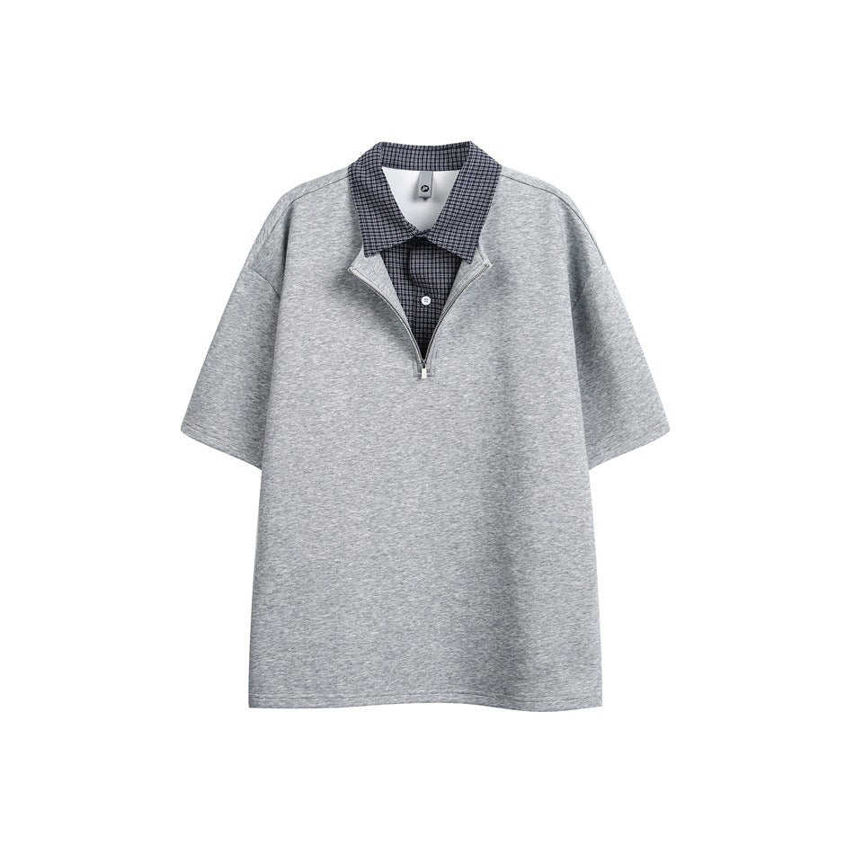 Heather gray half-zip short-sleeve top with navy check faux shirt collar, flat front view