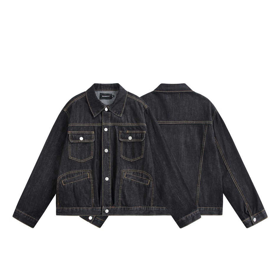 Black denim jacket shown from the front and back, with snap closures, chest pockets, and gold contrast stitching.