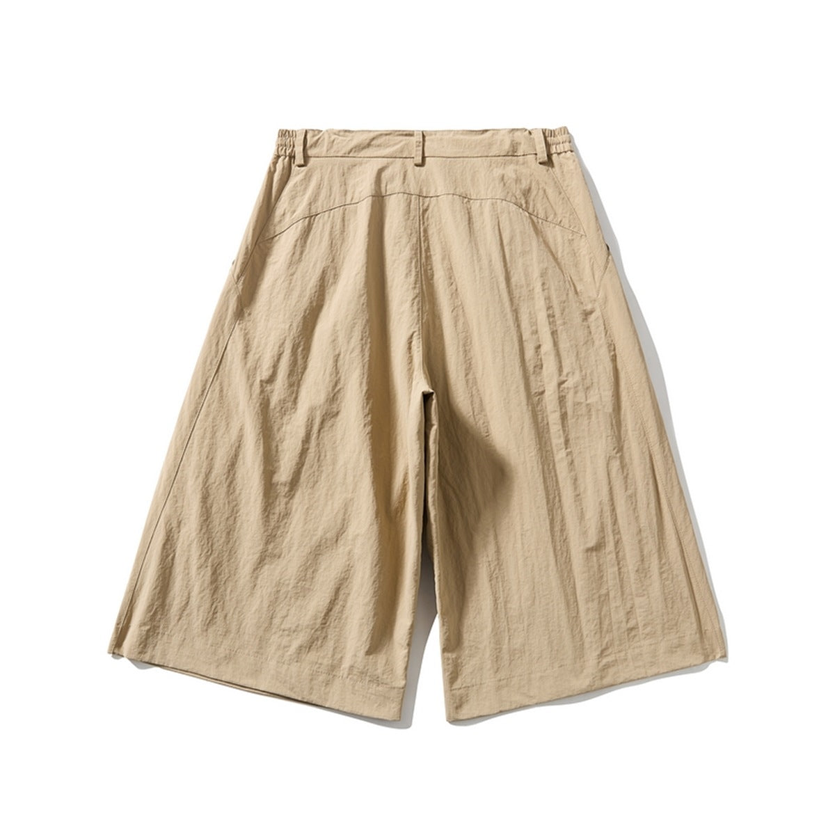 Back view of beige wide-leg shorts with an elasticated waistband, belt loops and curved seam detailing.