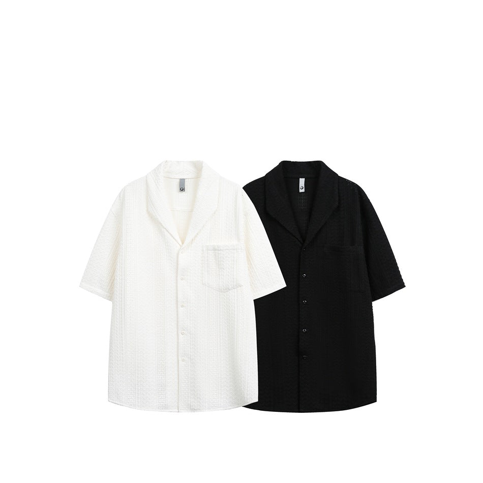 White and black short-sleeve button-up shirts shown side by side, each with a notched collar and chest pocket.