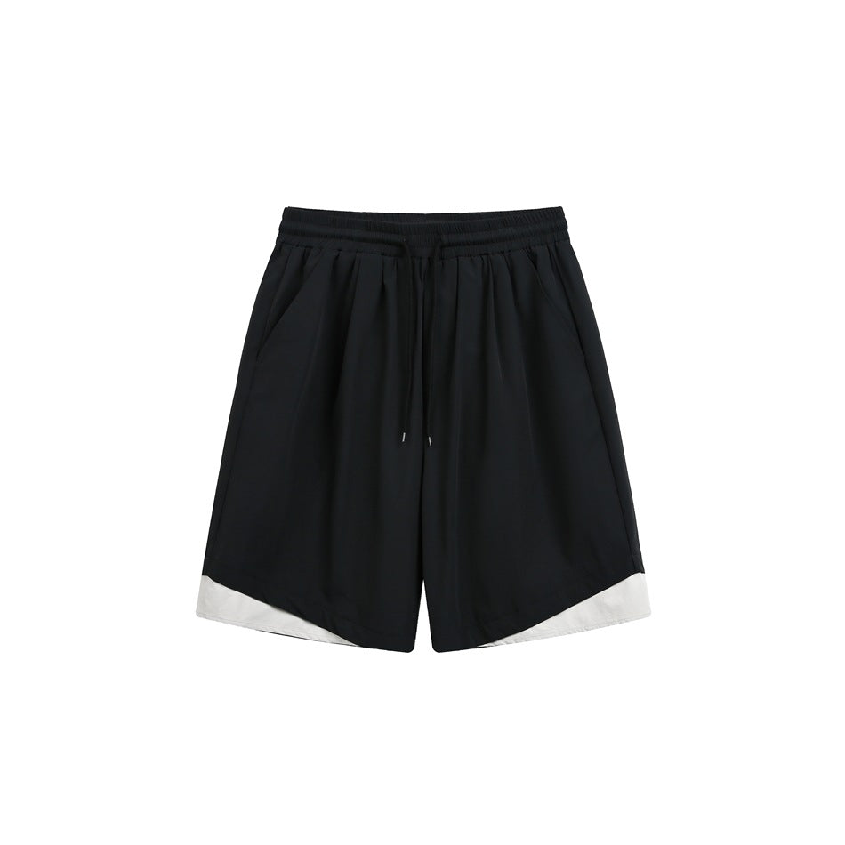 Black knee-length drawstring shorts with side pockets and off-white curved hem panels, front view