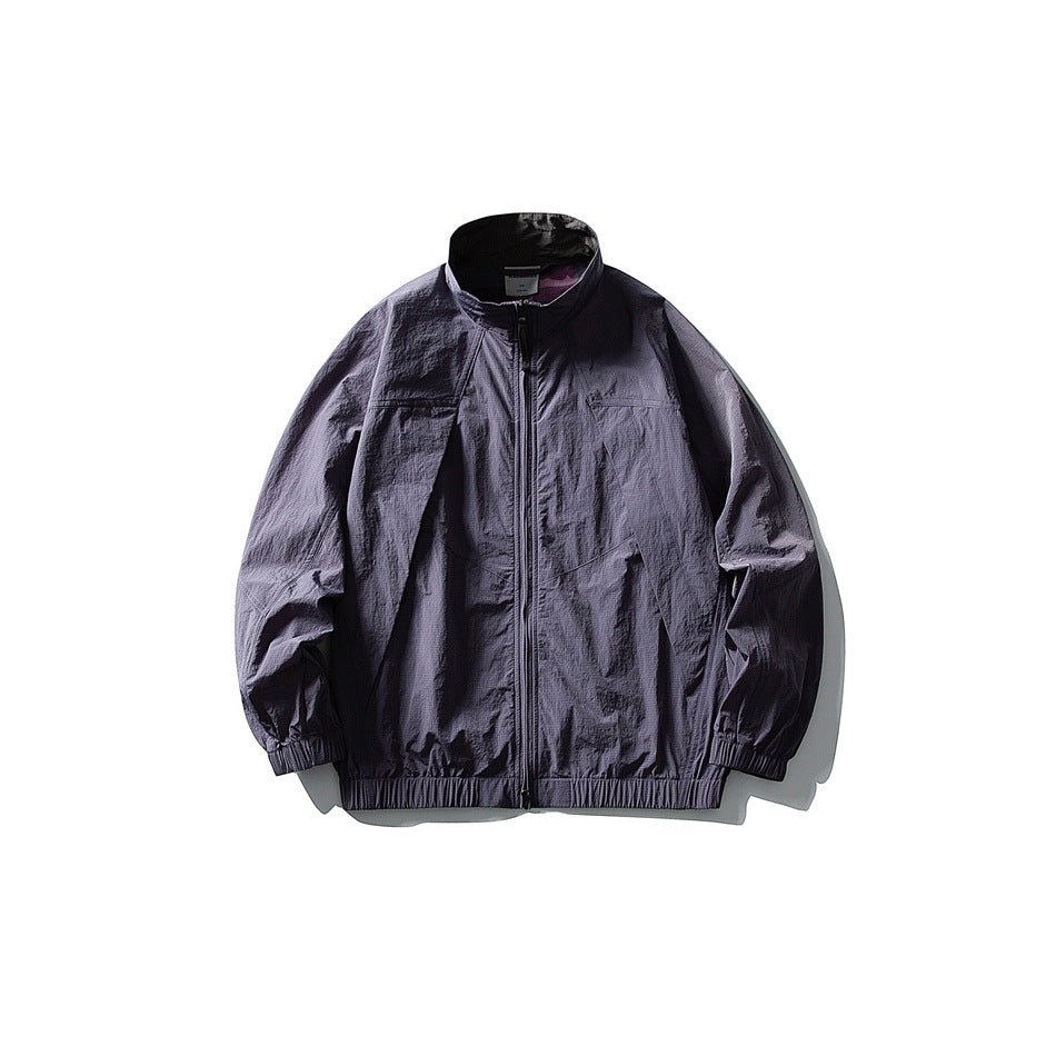Mineral purple zip-up stand-collar jacket with paneled seams and elastic cuffs and hem